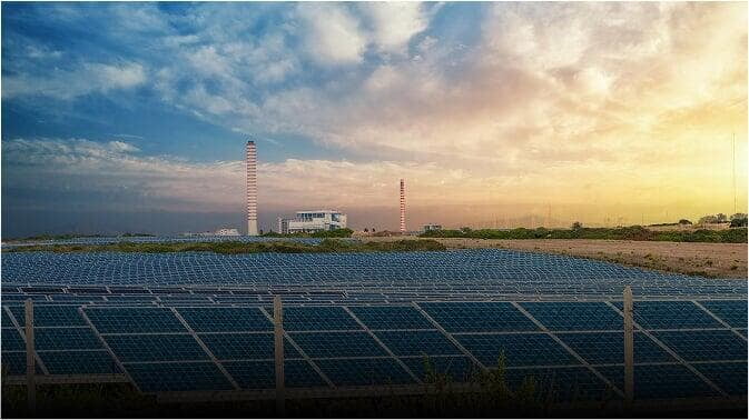 Solar panel farm under a bright sky — drone solar site surveying